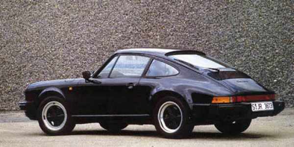 Black 1984 911 Carrera 3.2 seen from the side.